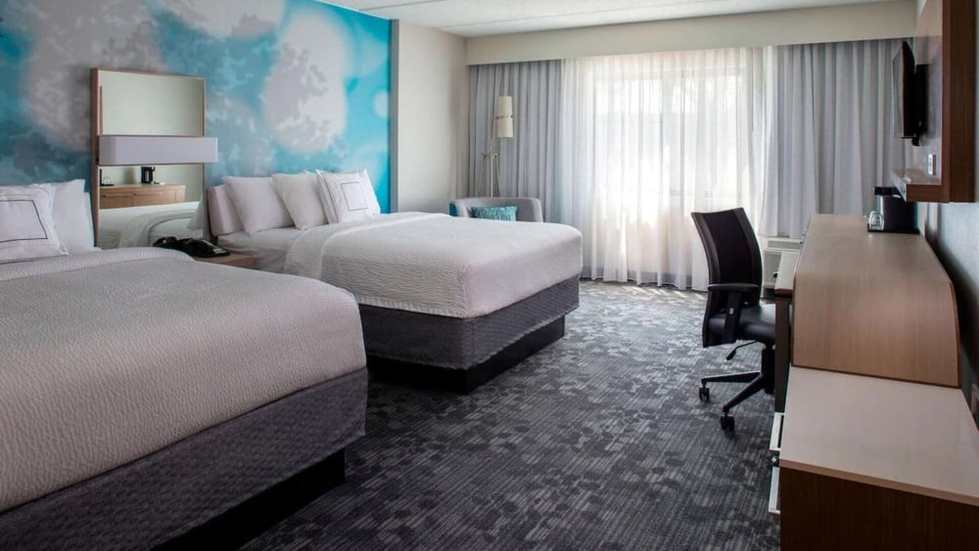 Day use twin room with work desk and big windows at Sonesta Select Atlanta Norcross I-85.