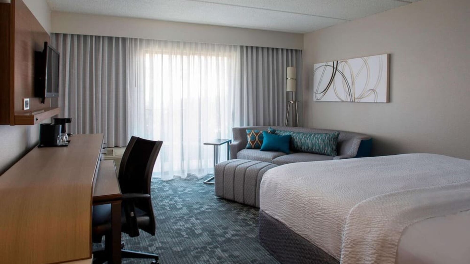Bright and spacious day use room with work desk at Sonesta Select Atlanta Norcross I-85.