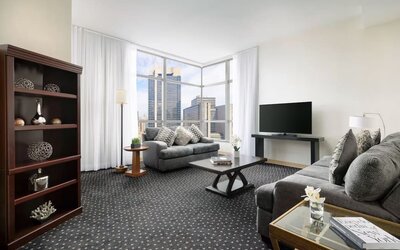 King room with lounge at Millennium Hotel Broadway Times Square.