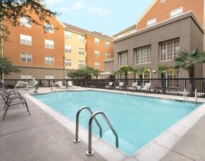 Outdoor pool at Homewood Suites By Hilton Shreveport.