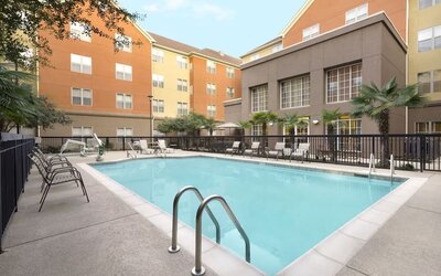 Outdoor pool at Homewood Suites By Hilton Shreveport.