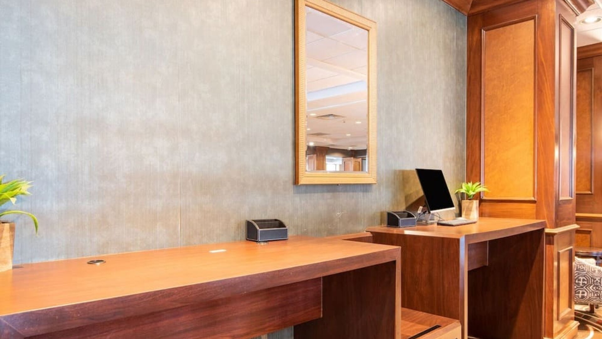 Lobby workspace with computer and printer at Wyndham Omaha. 