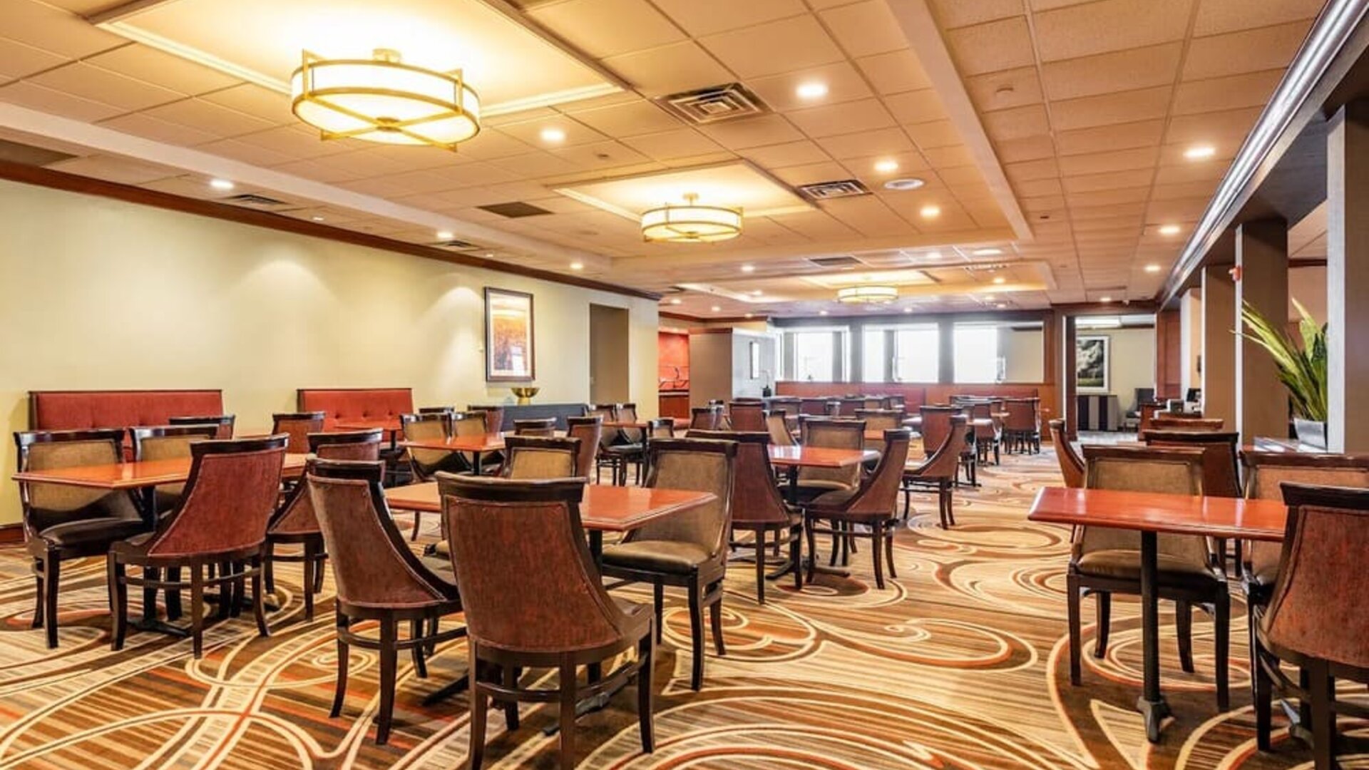 Dining area with comfortable seating at Wyndham Omaha.
