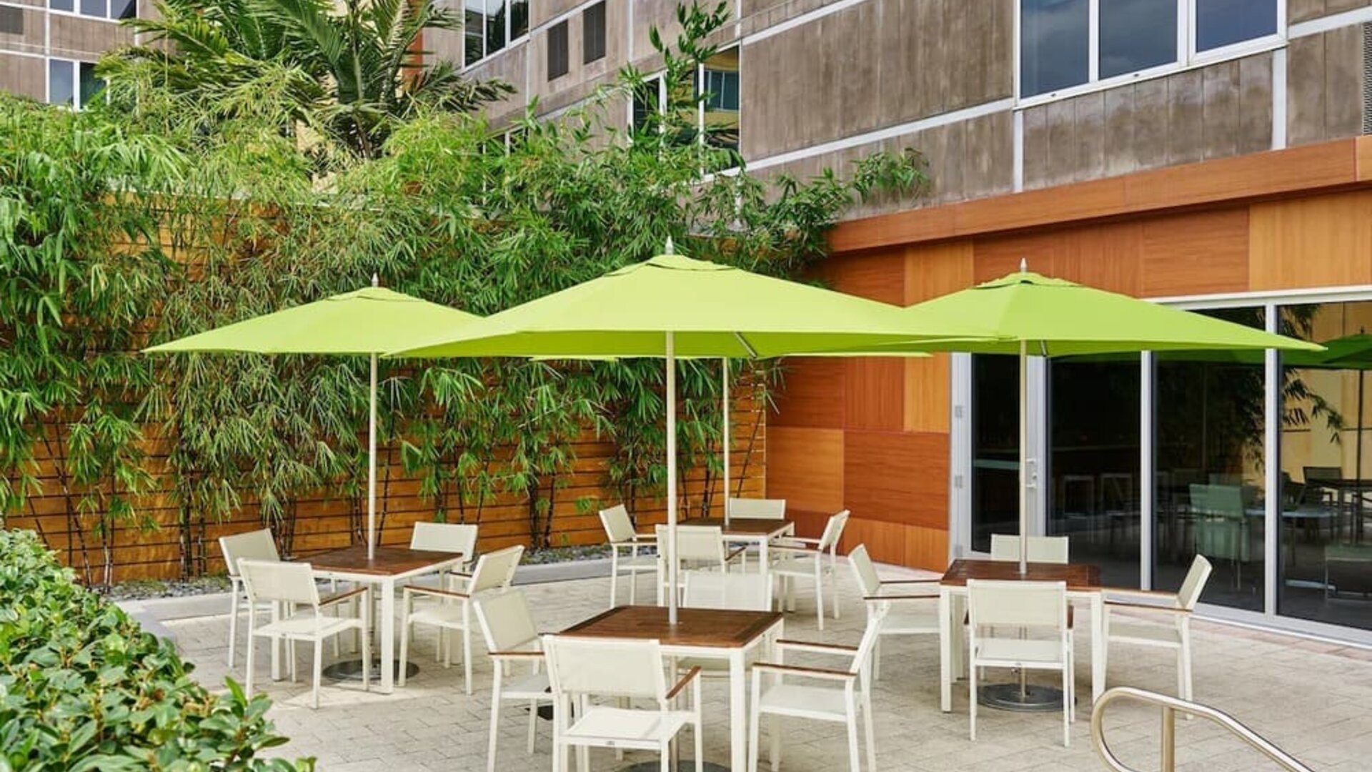 Hotel patio with seating at Element Miami International Airport.