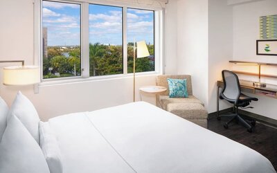 Day use room with work desk at Element Miami International Airport.