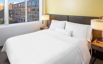 King bed at Element Miami International Airport.