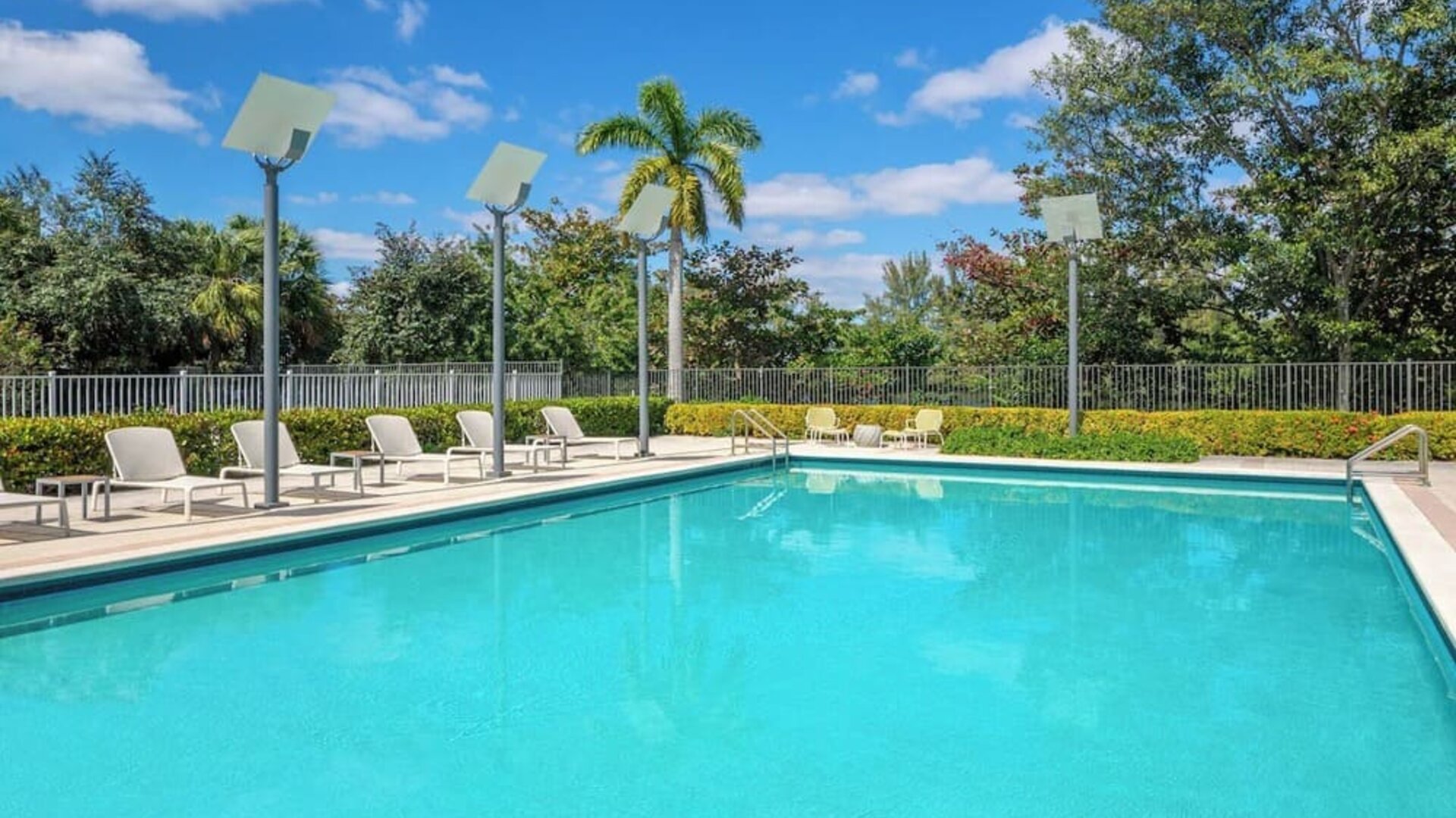 Outdoor pool at Element Miami International Airport.