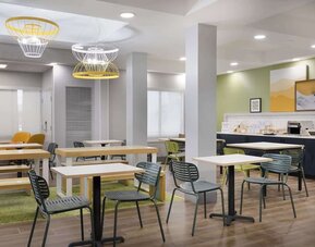 Dining area at Spark By Hilton Guelph.