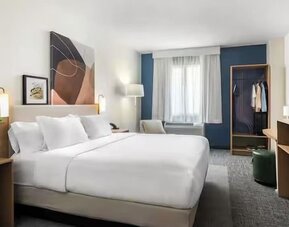 Day use room with king bed at Spark By Hilton Guelph.