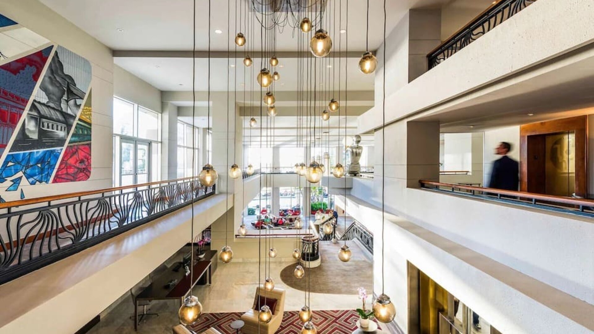 Lobby and coworking lounge at Pullman Miami Airport.