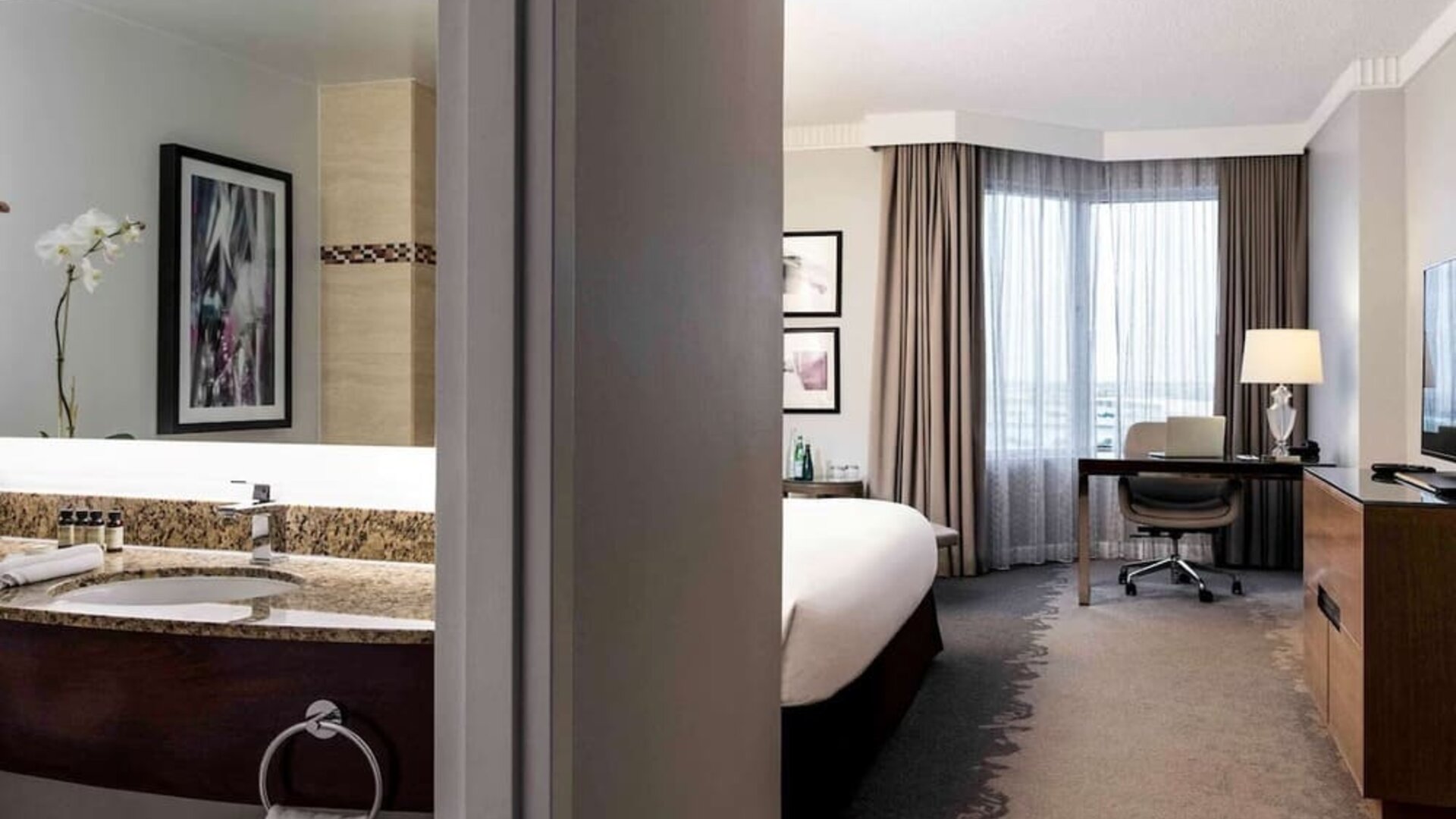 Day use room with work desk and private bathroom at Pullman Miami Airport.