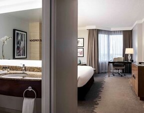 Day use room with work desk and private bathroom at Pullman Miami Airport.