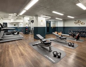 Well equipped fitness center at The Candler Hotel Atlanta, Curio Collection By Hilton.