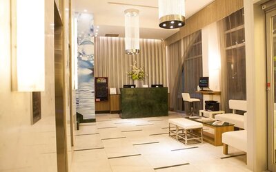 Hotel lobby and workspace at Wyndham Garden Brooklyn Sunset Park.