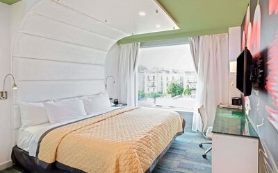 King room with comfortable bed and work desk at Wyndham Garden Brooklyn Sunset Park.