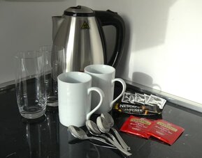 Coffee station at Aiello Rooms.
