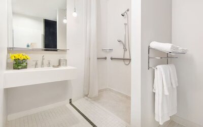 Private guest bathroom with shower at Nu Hotel - Brooklyn.