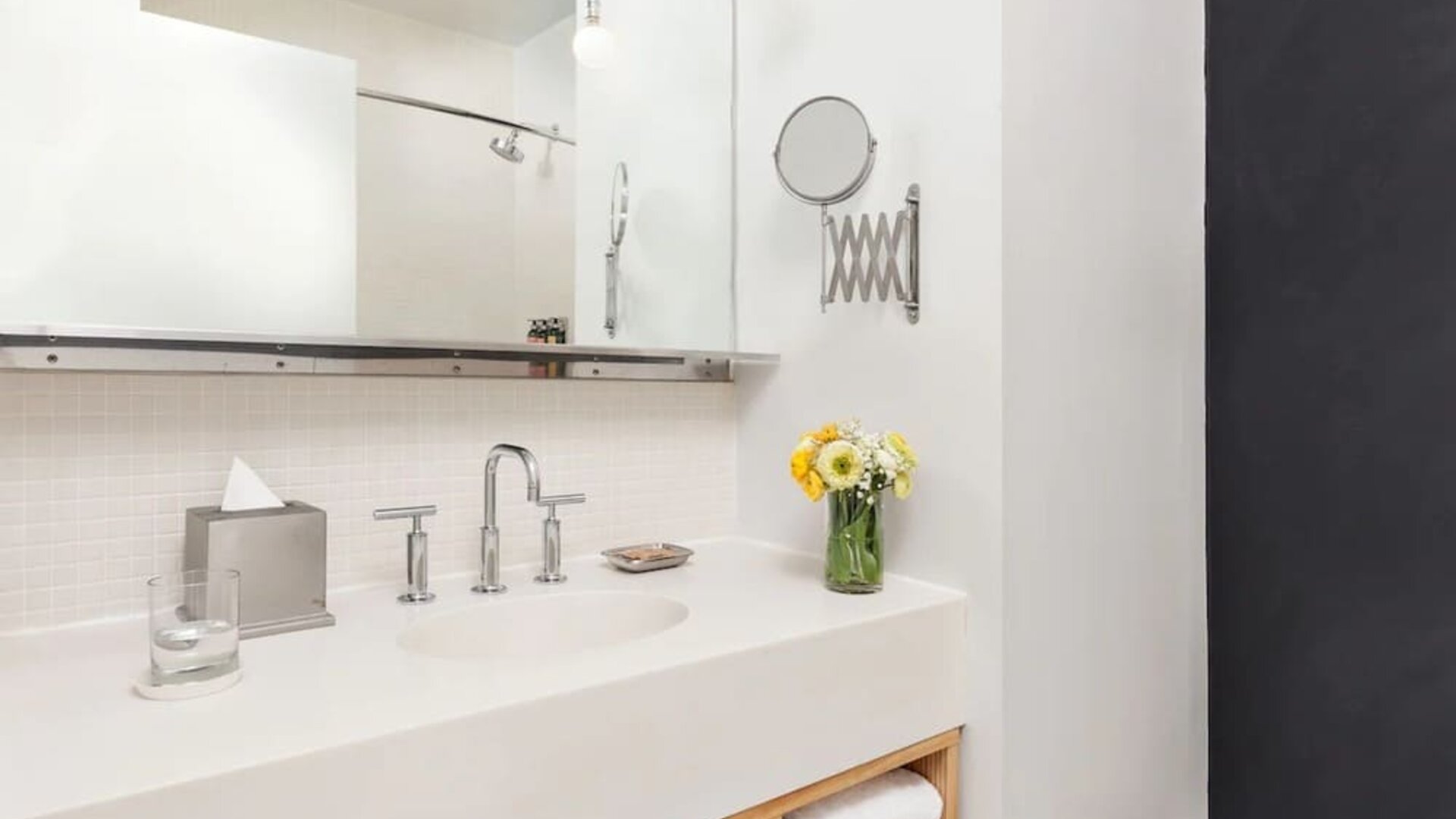 Private guest bathroom with shower and free toiletries at Nu Hotel - Brooklyn.