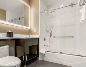 Private guest bathroom with free toiletries at Comfort Inn Prospect Park-Brooklyn.