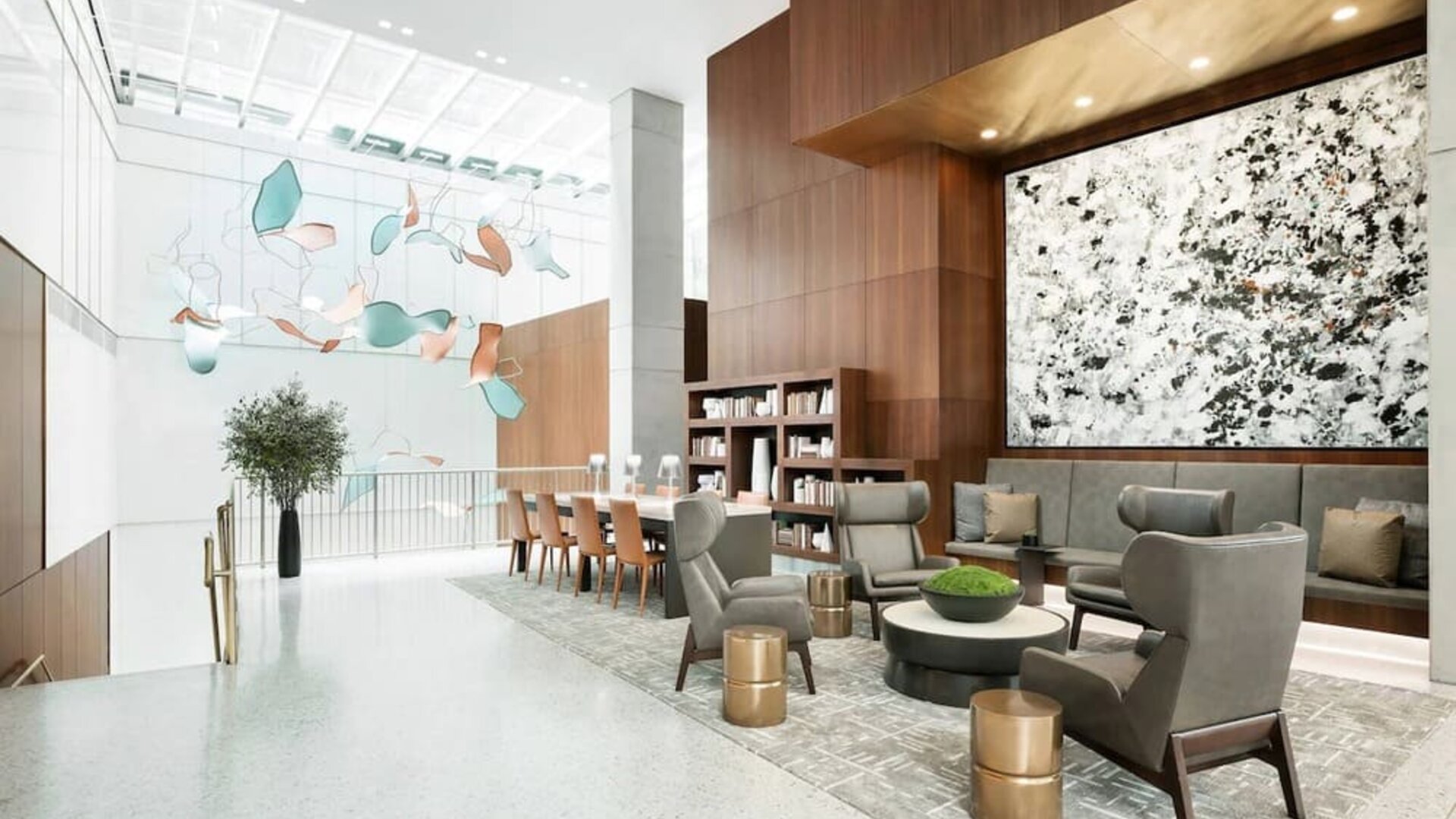 Lobby workspace and lounge area at AC Hotel New York Times Square.