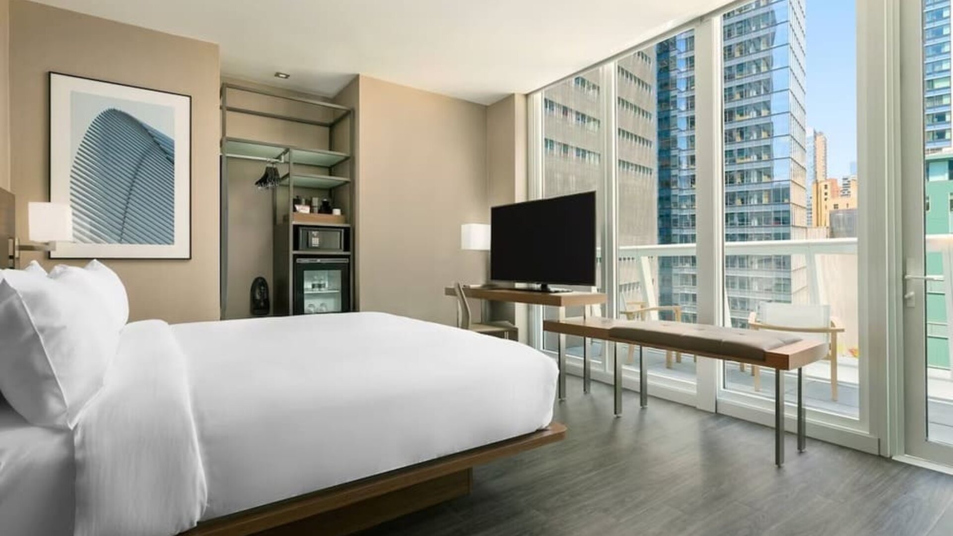 Day use room with work desk, balcony and private bathroom at AC Hotel New York Times Square.