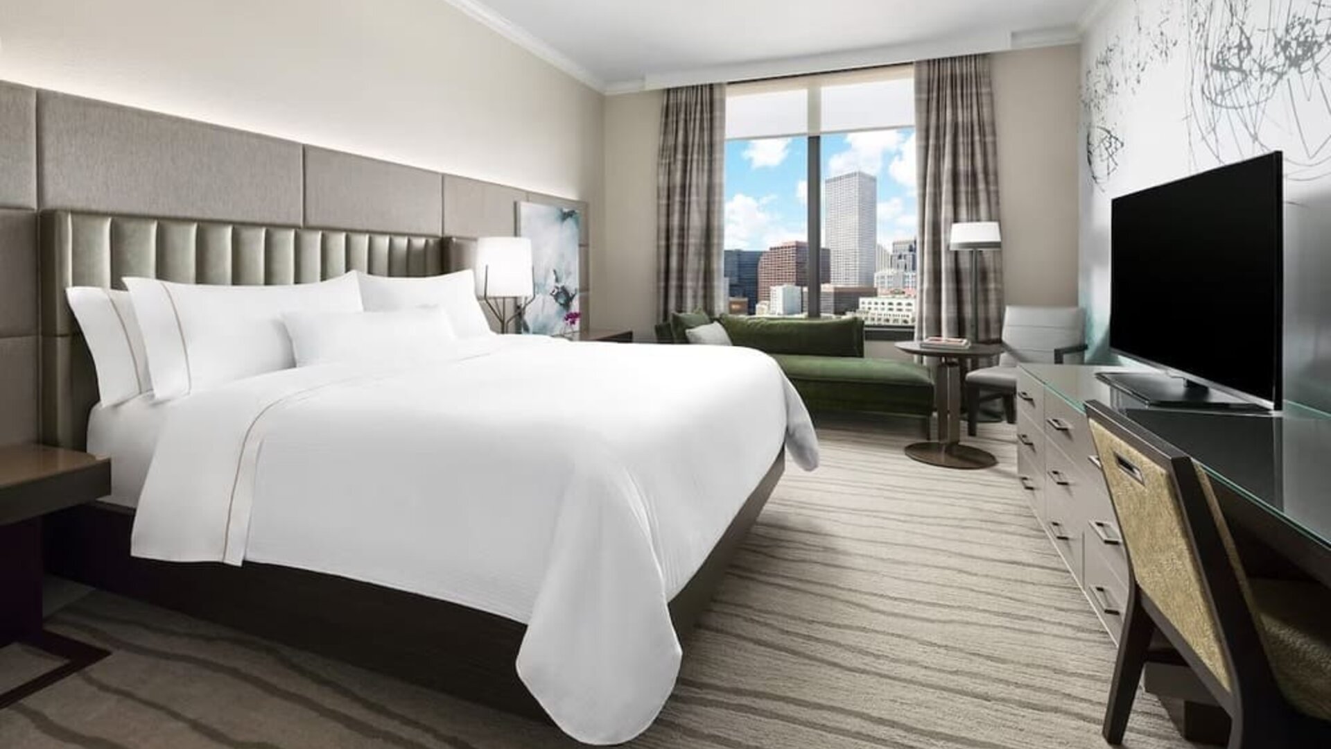Delux king room with TV and a great view of the city at The Westin New Orleans.