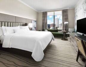 Delux king room with TV and a great view of the city at The Westin New Orleans.