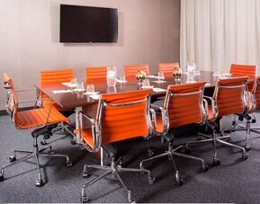 Professional meeting room with comfortable seating at Courtyard By Marriott New York Manhattan/Central Park.