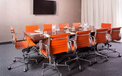 Professional meeting room with comfortable seating at Courtyard By Marriott New York Manhattan/Central Park.