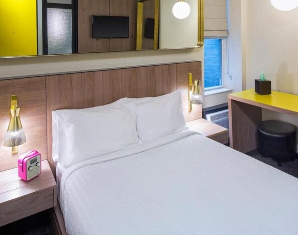 Day use room with king bed, work desk and private bathroom at Hotel Shocard NYC.