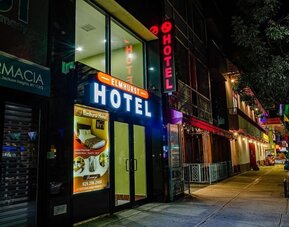 Exterior view and entrance at Elmhurst Hotel.