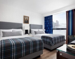 Day use twin room with work desk and private bathroom at Graduate New York.