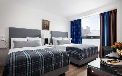 Day use twin room with work desk and private bathroom at Graduate New York.