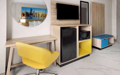 Day use rooms include work desk, mini-bar, TV screen and microwave at Days Inn By Wyndham Staten Island.