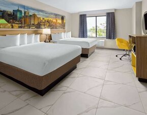 Day use twin room with work desk and private bathroom at Days Inn By Wyndham Staten Island.
