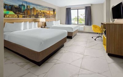 Day use twin room with work desk and private bathroom at Days Inn By Wyndham Staten Island.
