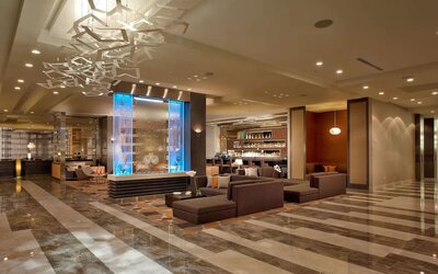 Hotel lobby with lounge seating at EB Hotel Miami. 