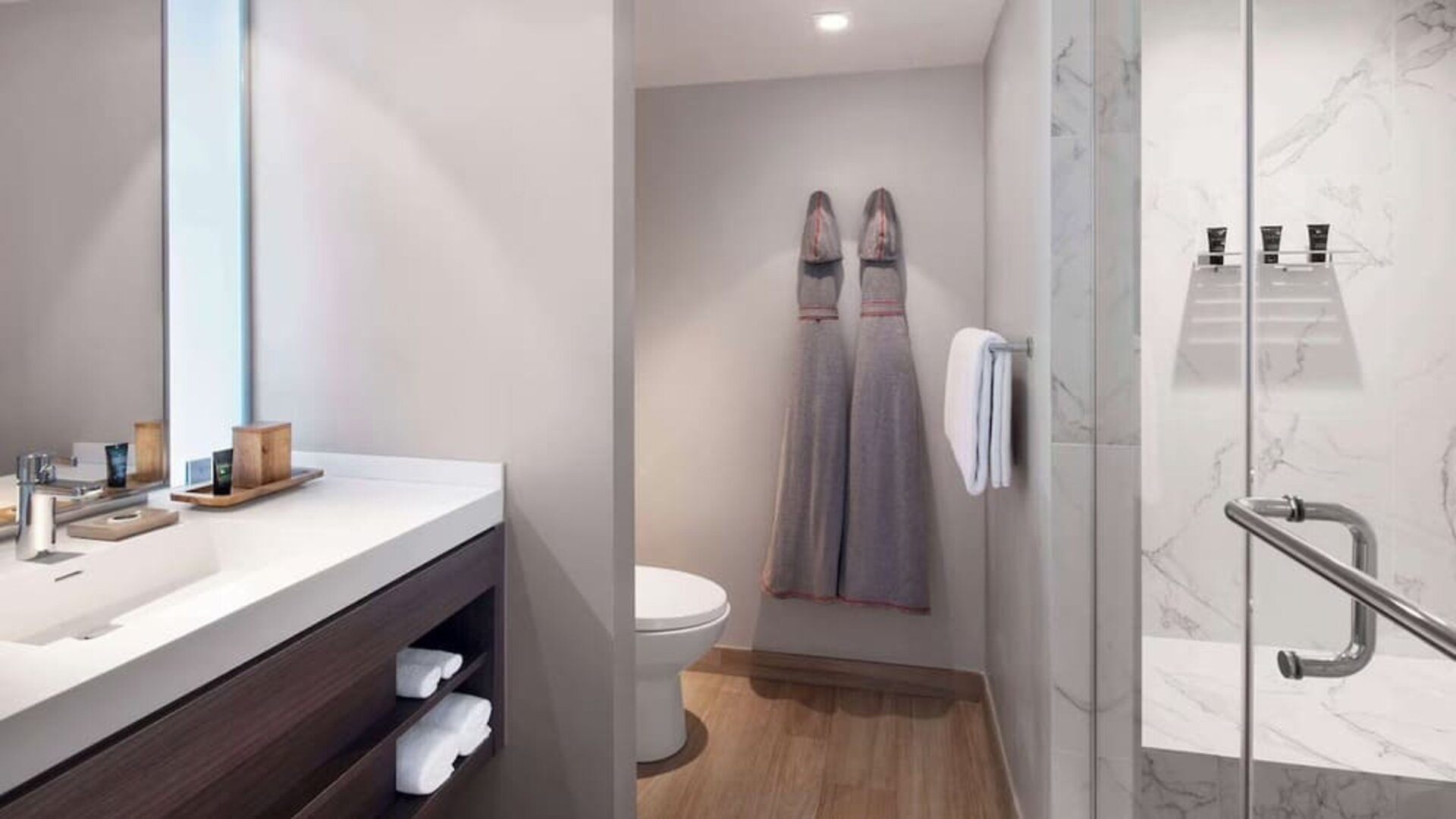 Guest bathroom with shower and free toiletries at Hyatt Centric Miami South Beach.