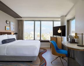 Day use room with king bed, work desk and private bathroom at Hyatt Centric Miami South Beach.