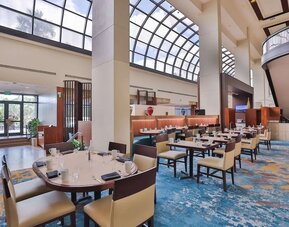 Dining area at Hilton Miami Airport Blue Lagoon.