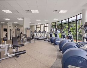 Fully equipped fitness center at Hilton Miami Airport Blue Lagoon.