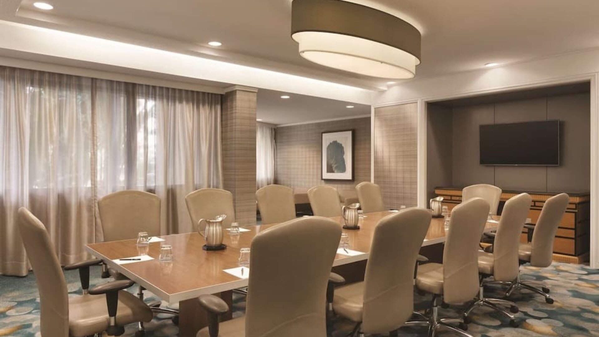Professional meeting room with comfortable seating at Hilton Miami Airport Blue Lagoon.