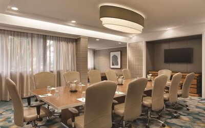 Professional meeting room with comfortable seating at Hilton Miami Airport Blue Lagoon.