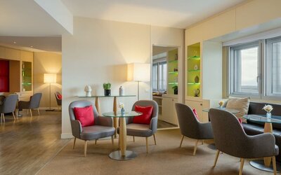 Lobby seating at Sheraton Paris Charles De Gaulle Airport Hotel.