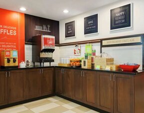 Breakfast area at Hampton Inn & Suites Denver Tech Center.