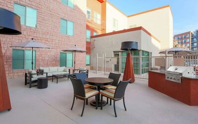 Outdoor terrace seating at Hampton Inn & Suites Denver Tech Center.