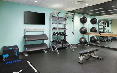 Fitness center at Tru By Hilton Atlanta Northlake Parkway.