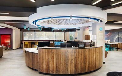 Reception desk at Tru By Hilton Atlanta Northlake Parkway.
