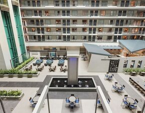 Dining area, workspace and lounge at Embassy Suites By Hilton Miami - International Airport.