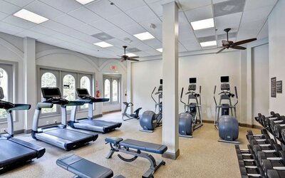 Fully equipped fitness center at Embassy Suites By Hilton Miami - International Airport.